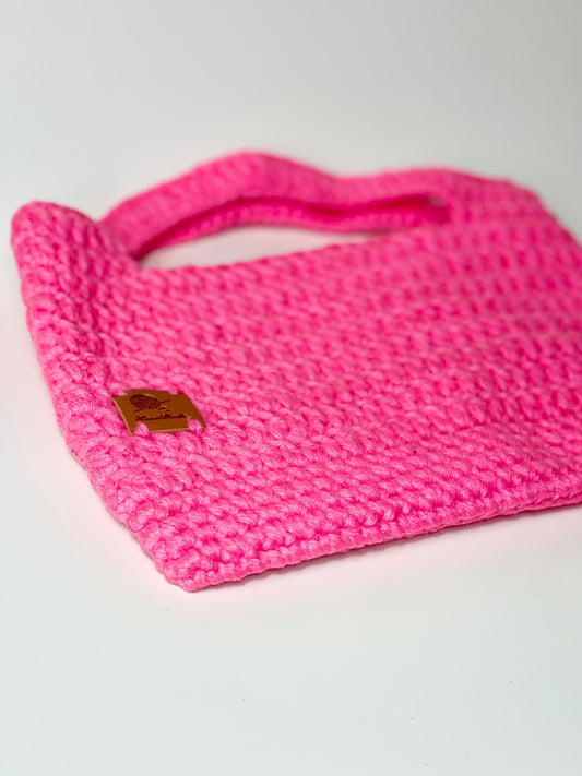 “Handmade pink purse wrapped as a gift for her – perfect birthday present”