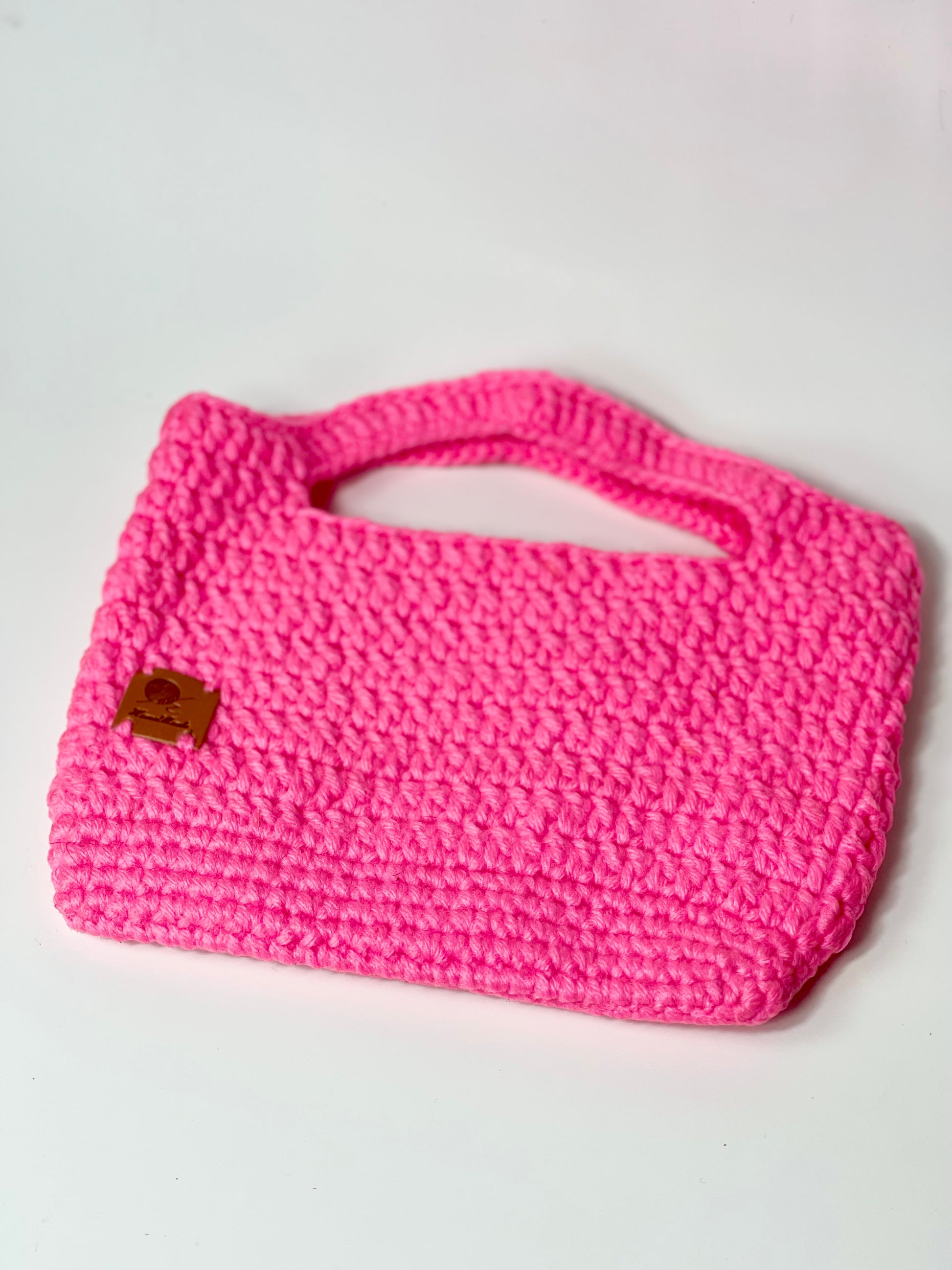 “Handmade pink purse wrapped as a gift for her – perfect birthday present”